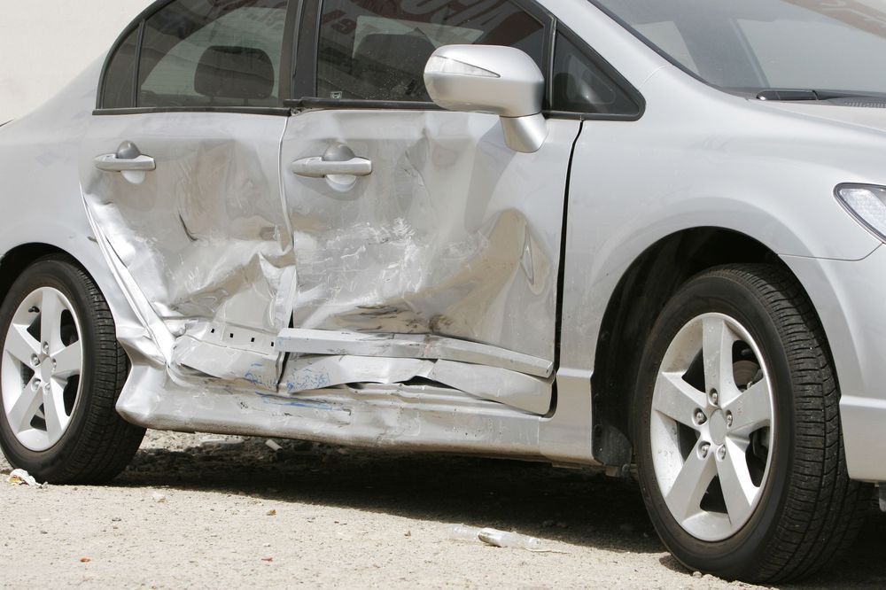 A badly dented car